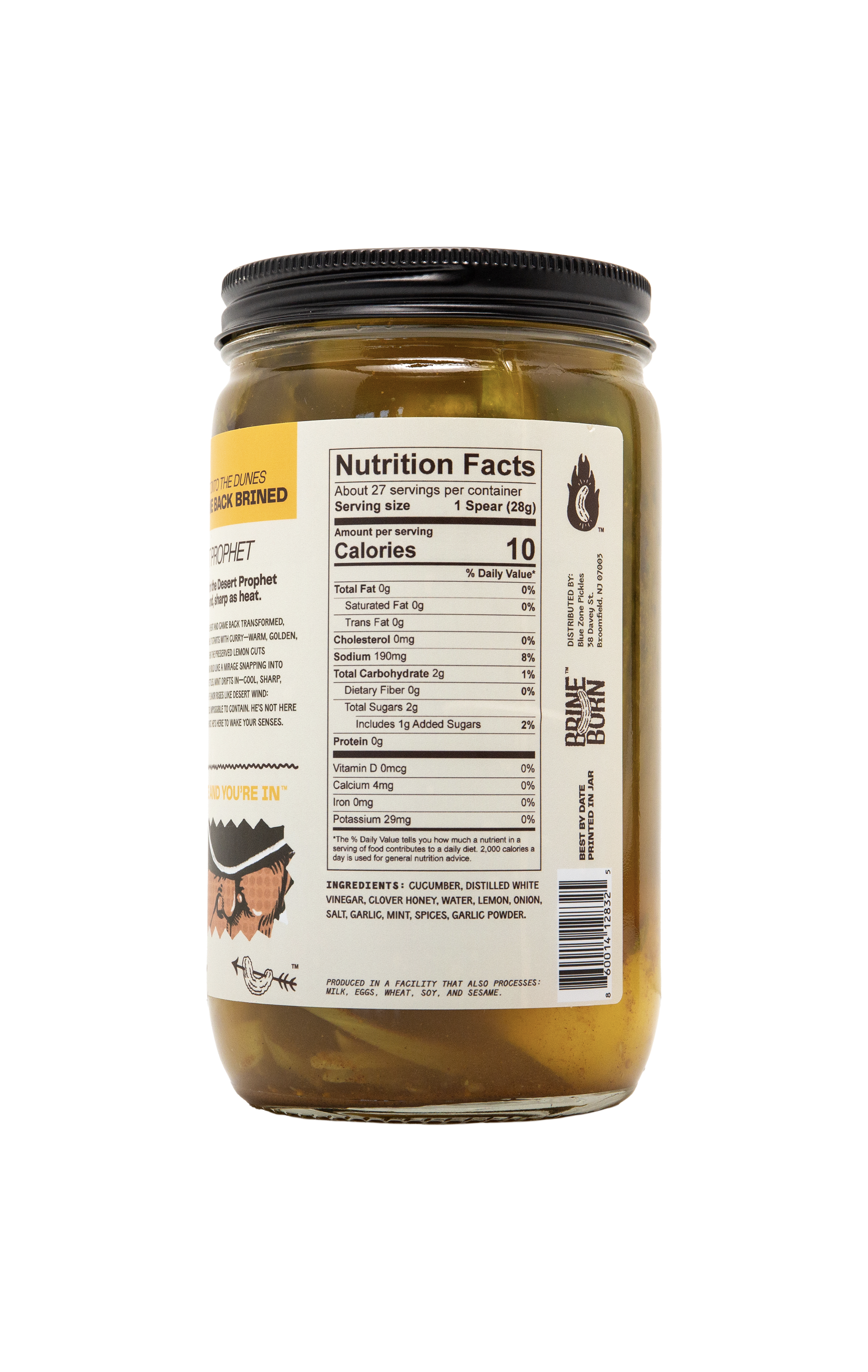 Back view of a Brineborn Desert Prophet pickle jar showing the nutrition facts panel, barcode, and yellow side label text.